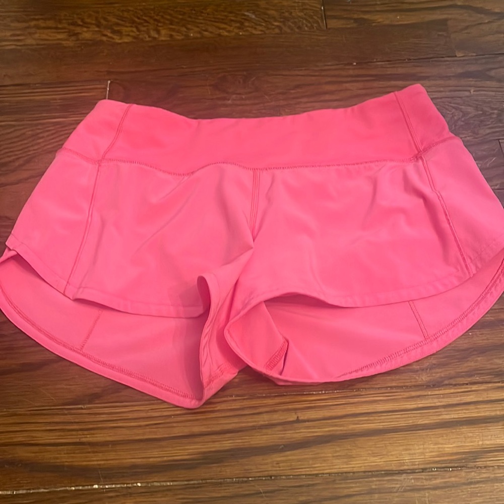 Size 2 lululemon shirts hot pink, bright pink in perfect condition.